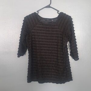 Investments brand ruffled black top